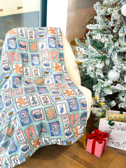 The Santas Stamps Human Blanket